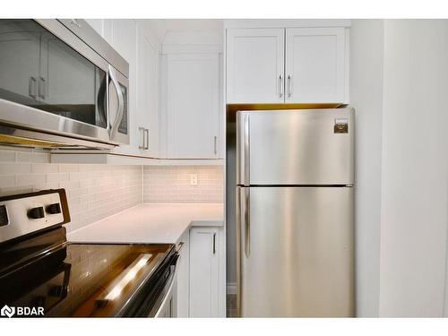 1208-140 Dunlop Street E, Barrie, ON - Indoor Photo Showing Kitchen With Stainless Steel Kitchen