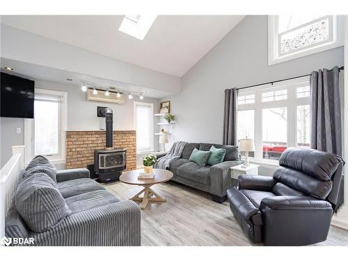 1078 Tiny Beaches Road S, Tiny, ON - Indoor Photo Showing Living Room With Fireplace