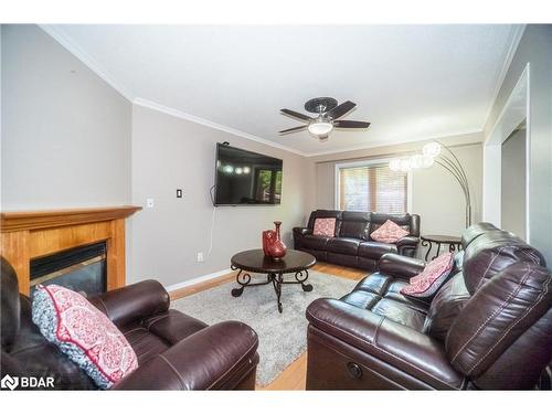 6 Leslie Avenue, Barrie, ON - Indoor Photo Showing Living Room With Fireplace