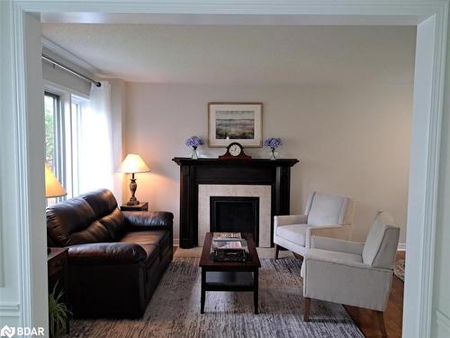 39 Oak Street, Alliston, ON - Indoor Photo Showing Living Room With Fireplace