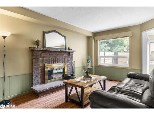 19 Peck Street, Barrie, ON - Indoor Photo Showing Living Room With Fireplace