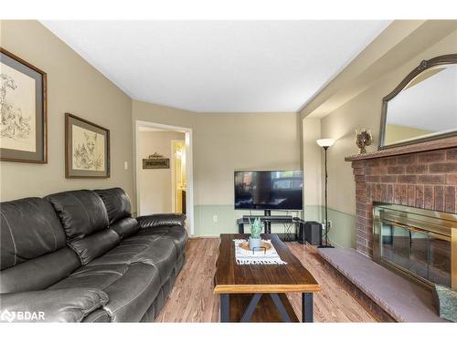 19 Peck Street, Barrie, ON - Indoor Photo Showing Living Room With Fireplace