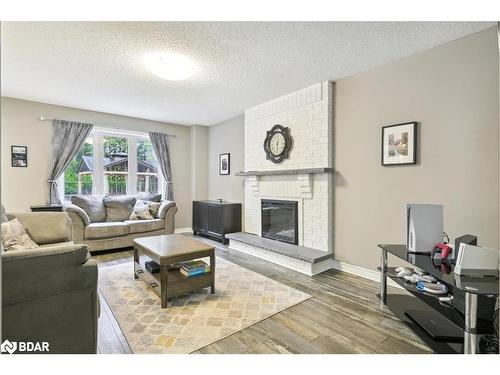 20 Iris Crescent, Brampton, ON - Indoor Photo Showing Living Room With Fireplace