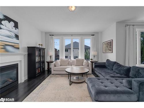 61 Sovereign'S Gate, Barrie, ON - Indoor Photo Showing Living Room With Fireplace