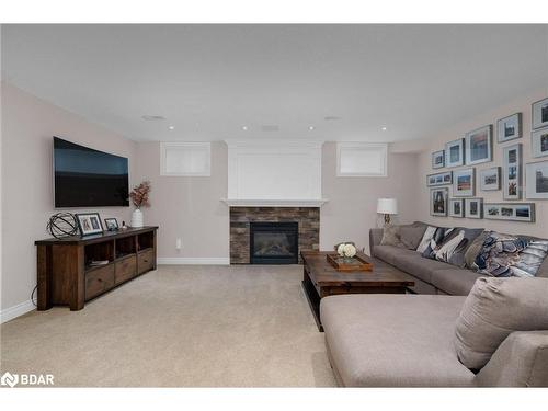 61 Sovereign'S Gate, Barrie, ON - Indoor Photo Showing Living Room With Fireplace