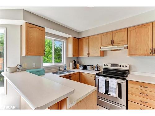 1067 Leslie Drive, Alcona, ON - Indoor Photo Showing Kitchen With Double Sink