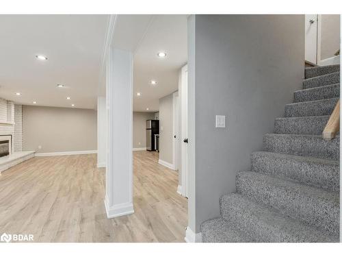 83 Marshall Street, Barrie, ON - Indoor Photo Showing Other Room With Fireplace