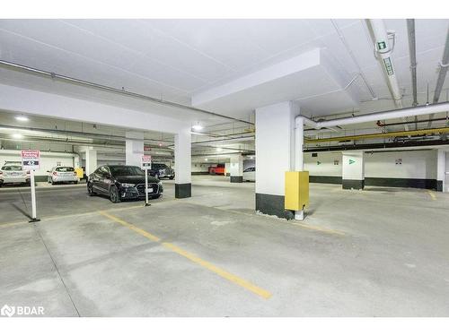 511-111 Worsley Street, Barrie, ON - Indoor Photo Showing Garage