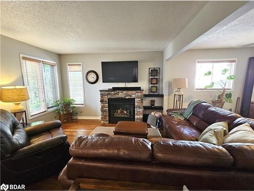 11 Nicholson Drive, Barrie, ON - Indoor Photo Showing Living Room With Fireplace