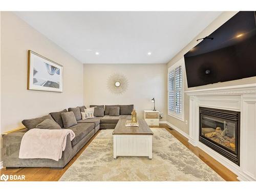 91 Cumming Drive, Barrie, ON - Indoor Photo Showing Living Room With Fireplace