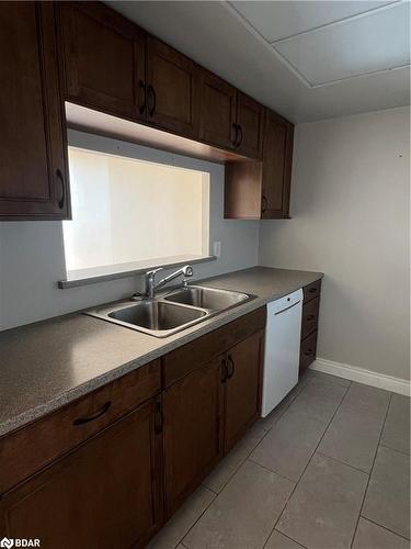 809-65 Ellen Street, Barrie, ON - Indoor Photo Showing Kitchen With Double Sink