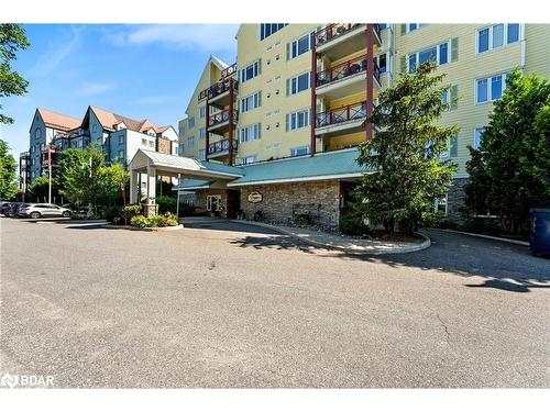 208-110 Steamship Bay, Gravenhurst, ON - Outdoor With Balcony With Facade