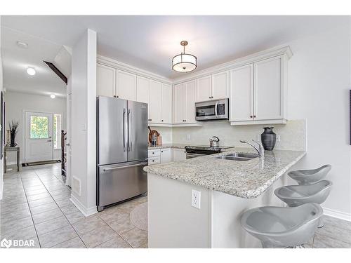 202 Sovereign'S Gate, Barrie, ON - Indoor Photo Showing Kitchen With Double Sink
