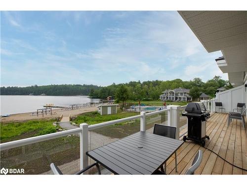 A203/204-1869 Highway 118 Road W, Bracebridge, ON - Outdoor With Body Of Water With Deck Patio Veranda With View With Exterior