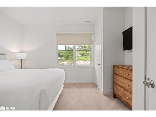 A203/204-1869 Highway 118 Road W, Bracebridge, ON - Indoor Photo Showing Bedroom