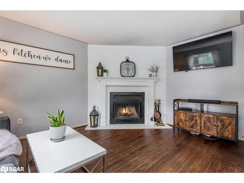 2107 Fennell Drive, Innisfil, ON - Indoor Photo Showing Living Room With Fireplace