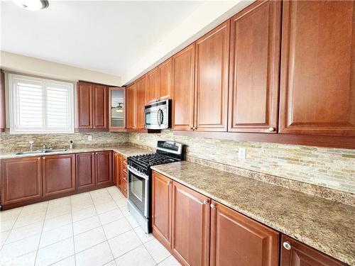 131 Prince William Way, Barrie, ON - Indoor Photo Showing Kitchen With Double Sink