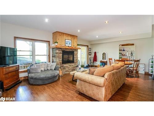 65 Big Sound Road, Mcdougall, ON - Indoor Photo Showing Living Room With Fireplace