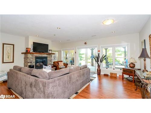 65 Big Sound Road, Mcdougall, ON - Indoor Photo Showing Living Room With Fireplace