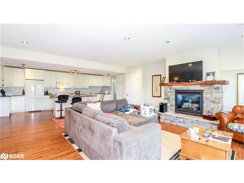 65 Big Sound Road, Mcdougall, ON - Indoor Photo Showing Living Room With Fireplace