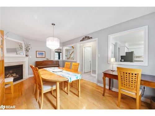 697 Happy Vale Drive, Innisfil, ON - Indoor Photo Showing Dining Room With Fireplace