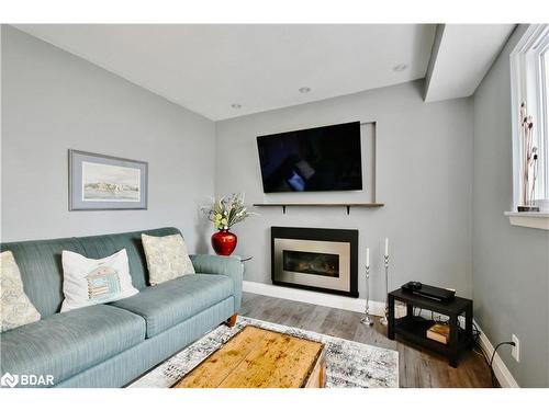 4653 Daniel Street, Ramara, ON - Indoor Photo Showing Living Room With Fireplace