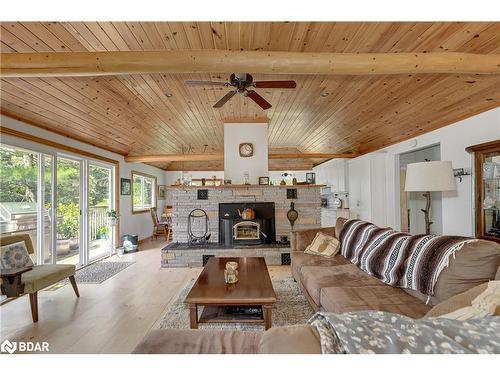 20 Black River Road, Washago, ON - Indoor Photo Showing Living Room With Fireplace