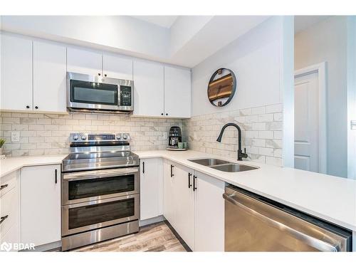 603-302 Essa Road, Barrie, ON - Indoor Photo Showing Kitchen With Double Sink With Upgraded Kitchen