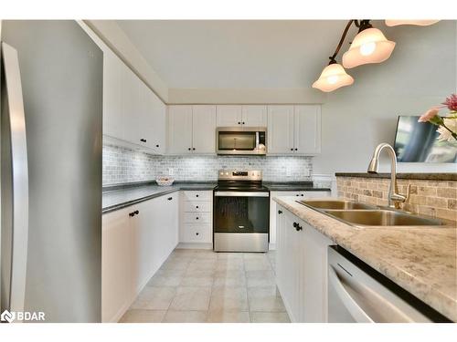 10 Princess Point Drive, Wasaga Beach, ON - Indoor Photo Showing Kitchen With Stainless Steel Kitchen With Double Sink With Upgraded Kitchen