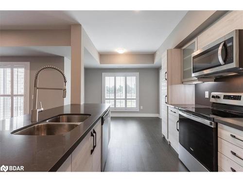 412-8 Culinary Lane Lane, Barrie, ON - Indoor Photo Showing Kitchen With Double Sink