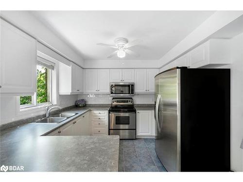 9 Brown Wood Drive, Barrie, ON - Indoor Photo Showing Kitchen With Double Sink