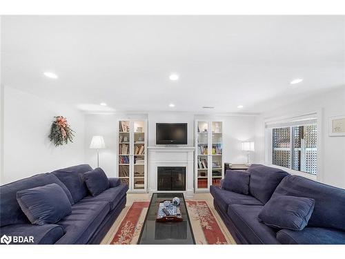 9 Brown Wood Drive, Barrie, ON - Indoor Photo Showing Living Room With Fireplace