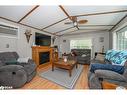 47-5216 County Road 90, Springwater, ON  - Indoor Photo Showing Living Room With Fireplace 