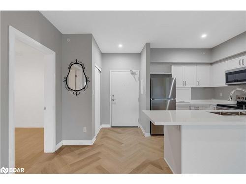 406-295 Cundles Road E, Barrie, ON - Indoor Photo Showing Kitchen With Double Sink