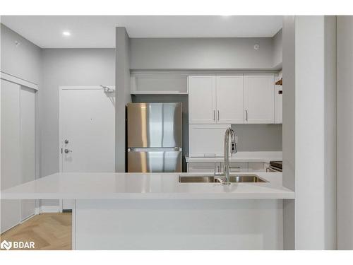 406-295 Cundles Road E, Barrie, ON - Indoor Photo Showing Kitchen With Double Sink