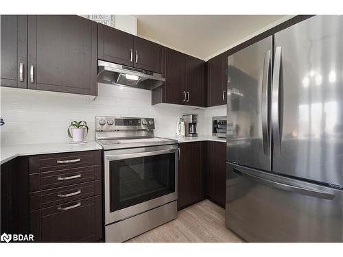 6-04-2420 Baronwood Drive Drive, Oakville, ON - Indoor Photo Showing Kitchen