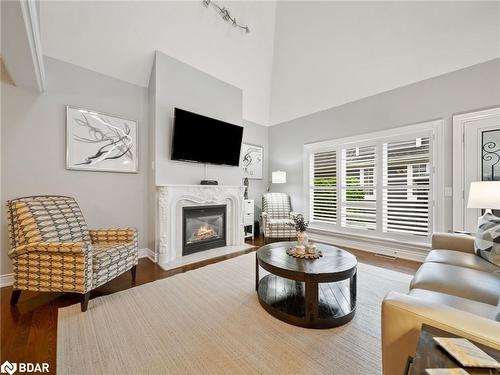 8-5 Invermara Court Court, Orillia, ON - Indoor Photo Showing Living Room With Fireplace