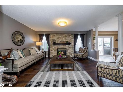 1258 Lowrie Street, Innisfil, ON - Indoor Photo Showing Living Room With Fireplace