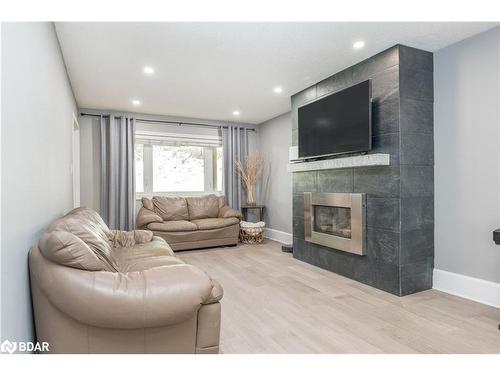 1 Pine Spring, Barrie, ON - Indoor Photo Showing Living Room With Fireplace