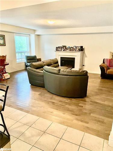 108 Fieldstream Chase, Bracebridge, ON - Indoor Photo Showing Living Room With Fireplace