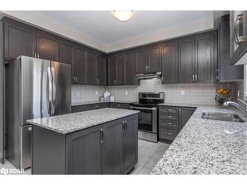 2061 Webster Boulevard Boulevard, Innisfil, ON - Indoor Photo Showing Kitchen With Double Sink With Upgraded Kitchen