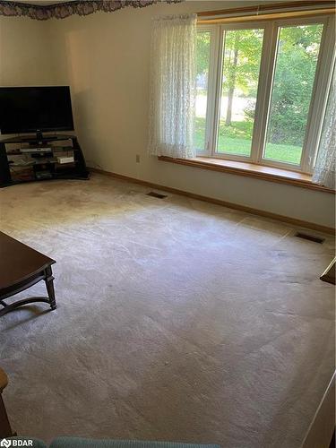 369 Indian Trail, Huntsville, ON - Indoor Photo Showing Living Room With Fireplace