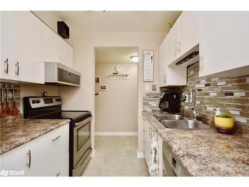 204-25 Meadow Lane, Barrie, ON - Indoor Photo Showing Kitchen With Double Sink