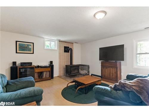 501 Golf Course Road, Powassan, ON - Indoor Photo Showing Living Room With Fireplace