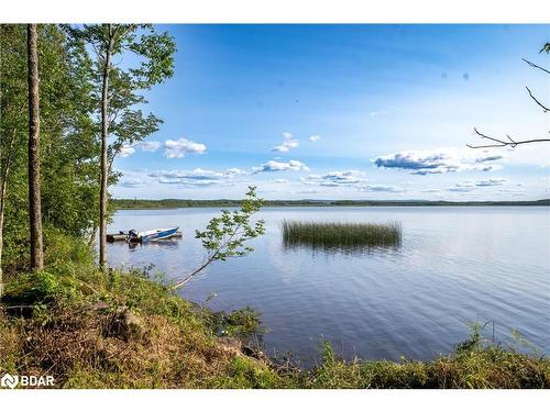 501 Golf Course Road, Powassan, ON - Outdoor With Body Of Water With View