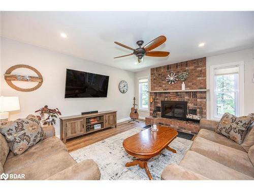 5 Nicholson Crescent, Minesing, ON - Indoor Photo Showing Living Room With Fireplace