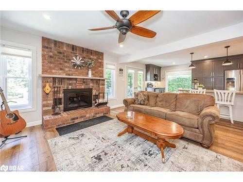 5 Nicholson Crescent, Minesing, ON - Indoor Photo Showing Living Room With Fireplace