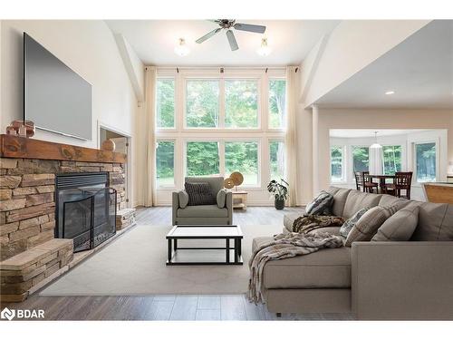 639 Concession 16 Road E, Tiny, ON - Indoor Photo Showing Living Room With Fireplace