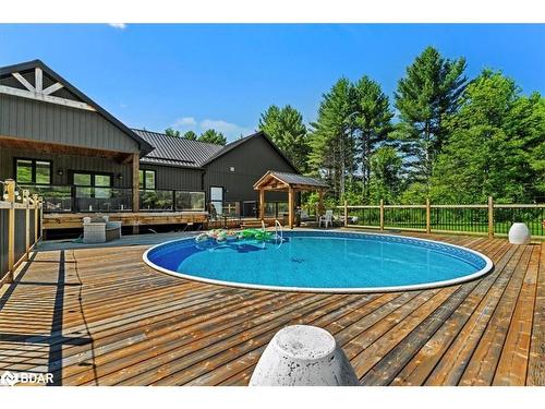 140 Centre Road, Madoc, ON - Outdoor With Above Ground Pool With Deck Patio Veranda With Backyard