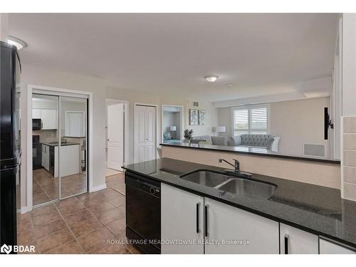 1416-8 Dayspring Circle, Brampton, ON - Indoor Photo Showing Kitchen With Double Sink